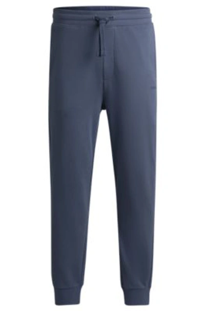 Hugo Boss Cotton-terry Tracksuit Bottoms With Logo Print In Light Blue