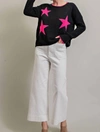 EESOME WOMEN'S SWEATER WITH HOT PINK STARS IN BLACK