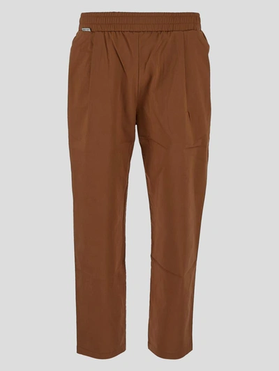 Family First Trousers In Orange