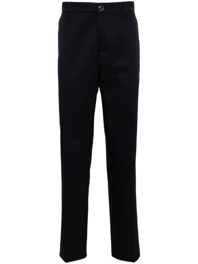 Versace Logo Detail Trousers In Blue
