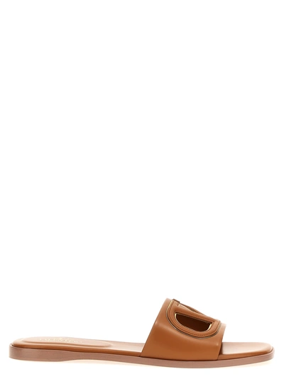 Valentino Garavani Vlogo Signature Flat Leather Sandals In Brown
