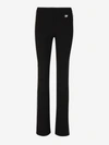 Off-white Side-stripe Ribbed Flared Trousers In Negre