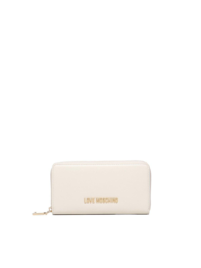 Moschino Logo Lettering Zipped Wallet In Avorio