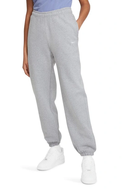 Nike Women's Solo Swoosh Fleece Trousers In Grey