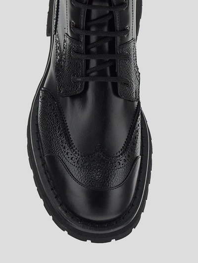 Alexander Mcqueen Grainth Leather Lace-up Boots In Black