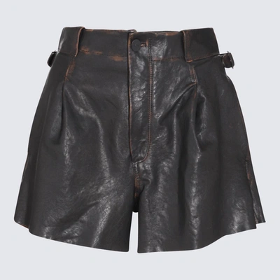 The Mannei Patent Leather Shorts In Black