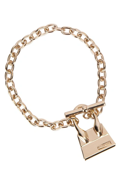 Jacquemus Gold-tone Chain Bracelet With Chiquito Charm In Brass And Bronze Woman