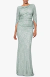 BETSY & ADAM DRAPE BACK CAPE SLEEVE LACE TRUMPET GOWN