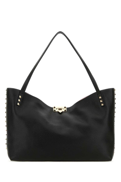 Valentino Garavani Handbags. In Black