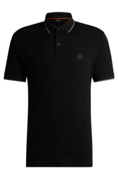 Hugo Boss Slim-fit Polo Shirt In Washed Stretch-cotton Piqu In Black