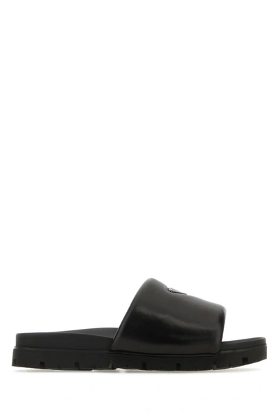 Prada Padded Nappa Leather Slides In Black