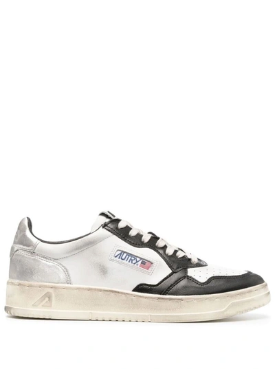 AUTRY BLACK AND WHITE 'MEDALIST' LOW TOP SNEAKERS DISTRESSED FINISH IN COW LEATHER