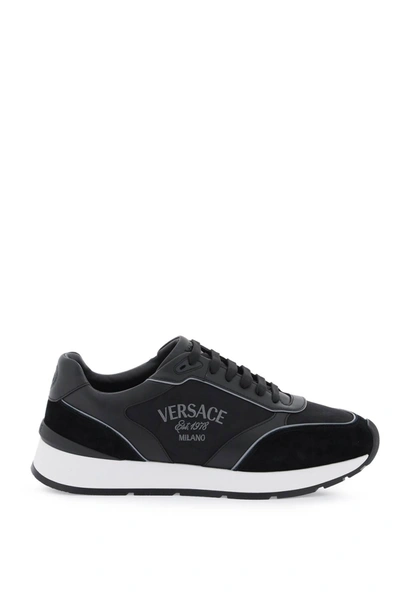 Versace Logo-embroidered Panelled Sneakers In Black
