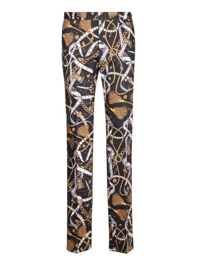 Moschino Graphic-print Cotton-blend Trousers In Black