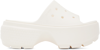 Crocs Logo Embossed Slippers In Chalk