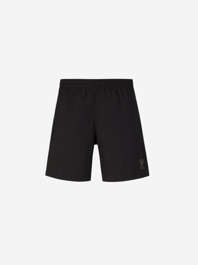 Alexander Mcqueen Logo Embroidered Technical Swimshorts In Negre