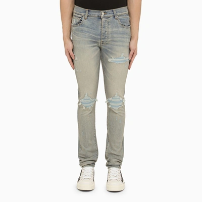 AMIRI ANTIQUE INDIGO SLIM JEANS WITH RIPS