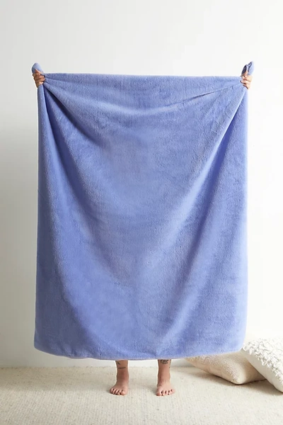Urban Outfitters Harper Faux Fur Solid Throw Blanket In Blue At