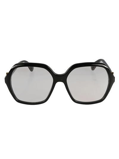 Cartier Pentagon Rim Clear Lens Glasses In Black/transparent