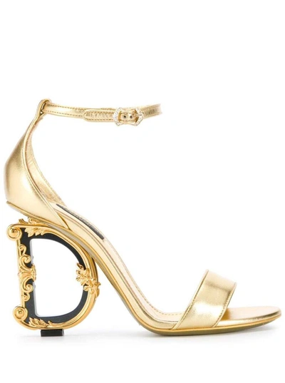 DOLCE & GABBANA 'BAROQUE' GOLD COLORED SANDALS WITH LOGO HEEL IN LEATHER WOMAN