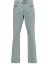 Moschino Straight Jeans With A Faded Effect In Blue