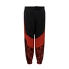 Dolce & Gabbana Jogging Pants With Animal Print In Black