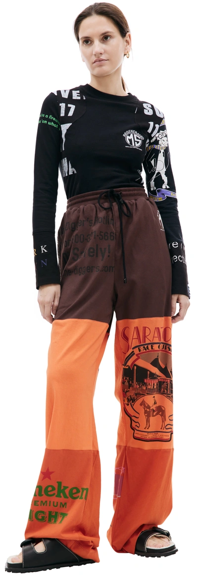 Marine Serre Regenerated Graphic-print Patchwork Trousers In Black/red