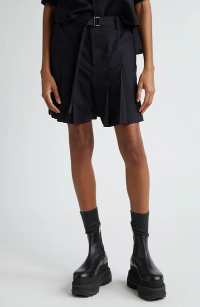 SACAI PINSTRIPE BELTED PLEATED SHORTS