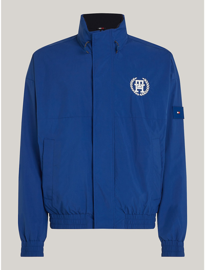 Tommy Hilfiger Reversible Th Laurel Logo Windbreaker In Anchor Blue