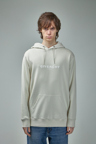 Givenchy Logo Print Drawstring Hoodie In Blu