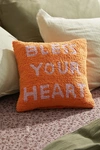 URBAN OUTFITTERS BLESS YOUR HEART THROW PILLOW IN ORANGE AT URBAN OUTFITTERS