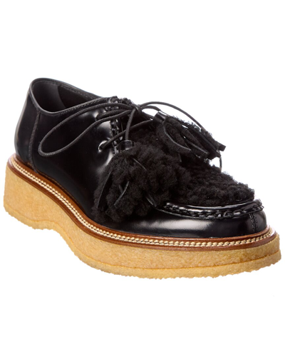 Tod's Fringed Patent Platform Loafer In Black