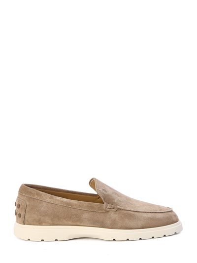 Tod's Logo Embossed Suede Loafers In Beige