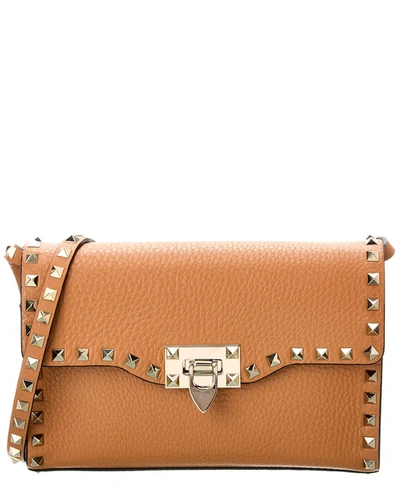 Valentino Garavani Valentino Rockstud Small Grainy Leather Crossbod In Brown