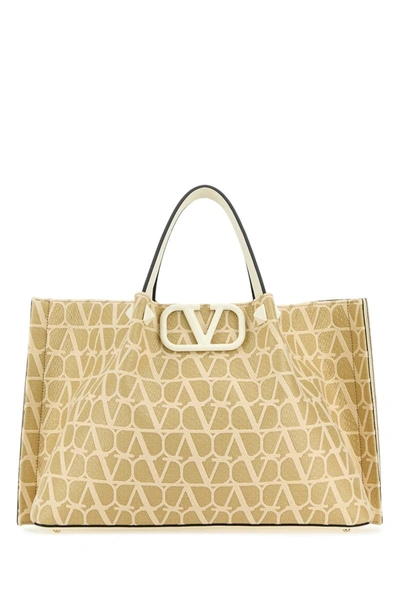 Valentino Garavani Handbags. In Naturaleivory