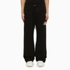 Amiri Logo Printed Wide Leg Jogging Trousers In Black