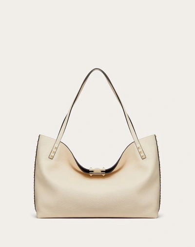 Valentino Garavani Medium Rockstud Grainy Calfskin Bag With Contrasting Lining Woman Light Ivory/rub In Orange