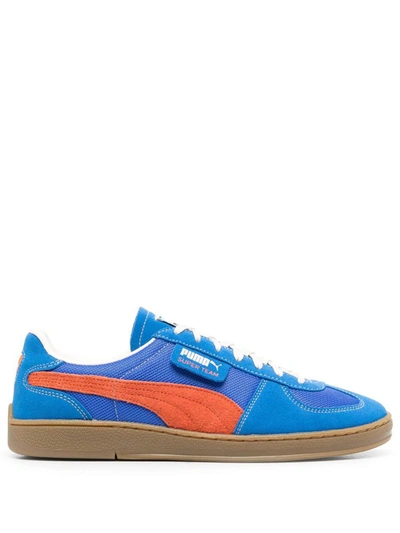 Puma Super Team Handy Shoes In Ultra Blue Rickie Orange