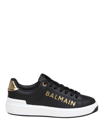 Balmain B-court Sneakers In Black And Gold Leather