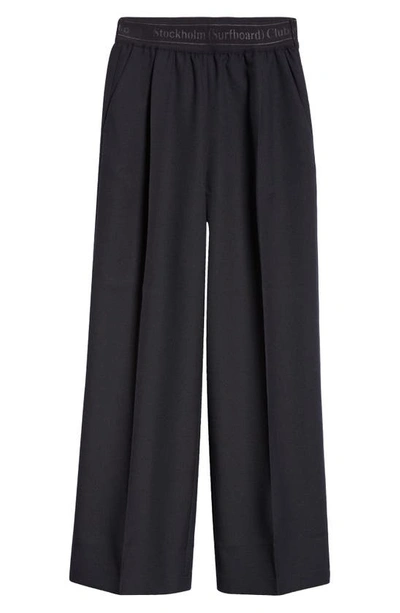 Stockholm Surfboard Club Elaine Logo Jacquard Waist Pleated Wide Leg Pants In Black