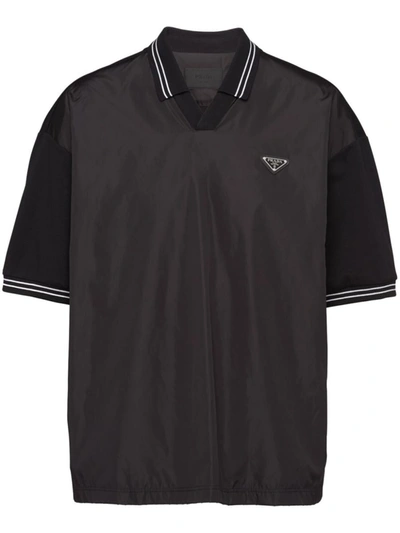 Prada Poloshirt Aus Piqué Mit Detail Aus Re-nylon In Nero