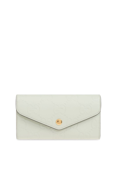 Gucci Logo Embossed Envelope Wallet In Green