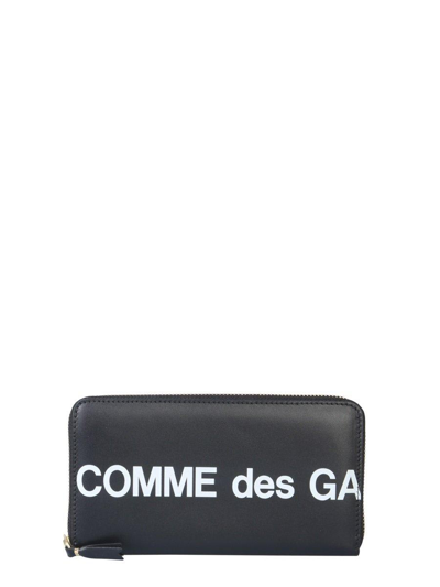 Comme Des Garçons Huge Logo Print Wallet In Black