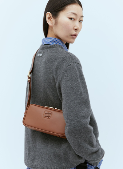 Miu Miu Logo-plaque Leather Shoulder Bag In Brown