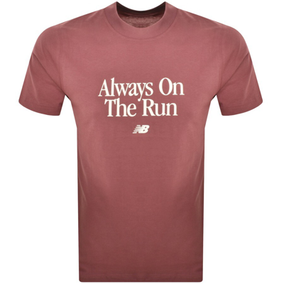 New Balance Run Slogan T Shirt Burgundy In Pink