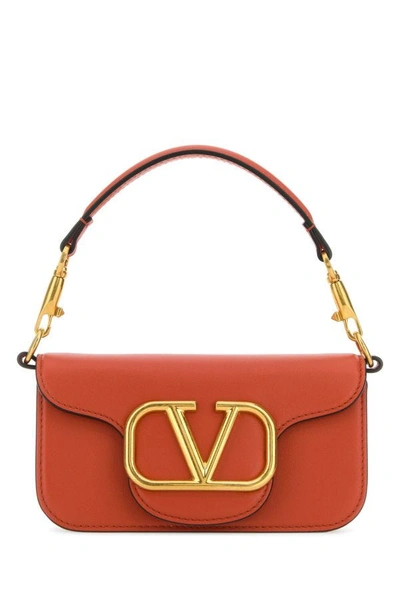 Valentino Garavani Woman Brick Leather Locã² Clutch In Red