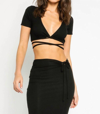 OLIVACEOUS RIBBED STRAPPY TEE IN BLACK