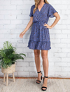 FSL APPAREL LEOPARD PRINT SURPLICE DRESS IN INDIGO BLUE