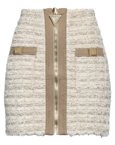 Balmain Button Embellished Front Zip Tweed Mini Skirt In Beige