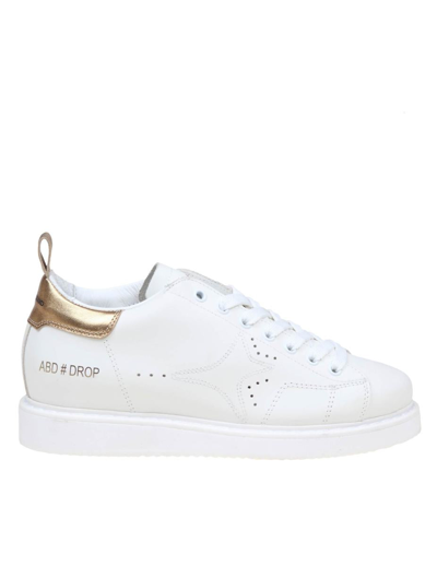 Ama Brand Leather Trainers In White/gold
